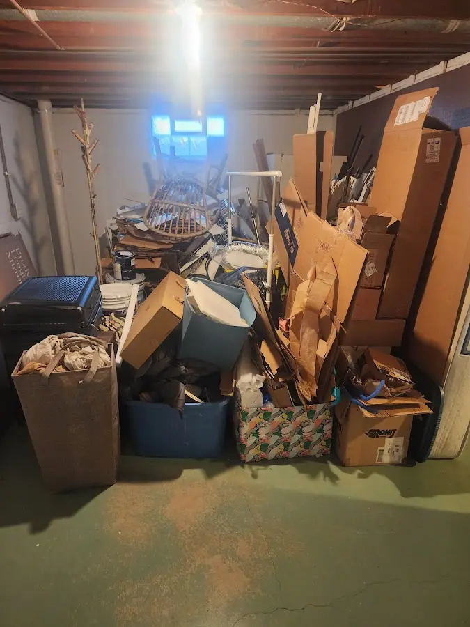 Roll-off dumpster container at job site for 2 Yard Dumpster Rental in Lucas